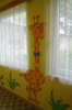 Žluťásci - výmalba na chodbě ke třídě Žluťásků, žirafa 